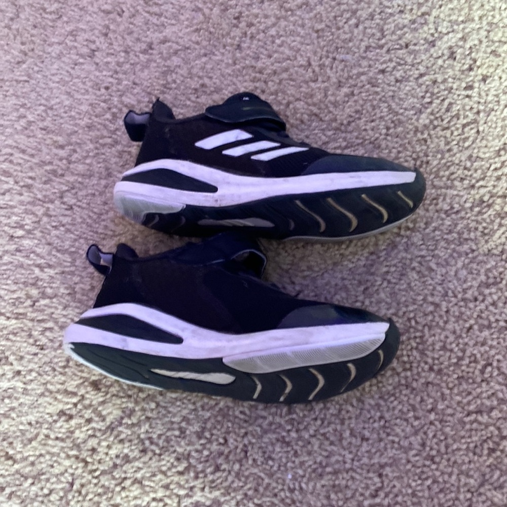 Black and white kids Adidas shoes